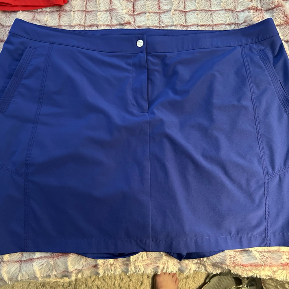 Women’s Blue Skorts, size 4 / 18.  Great condition. Two pockets front and back.